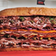 Illustration for article titled Behold the Meatiest Sandwich in Human History